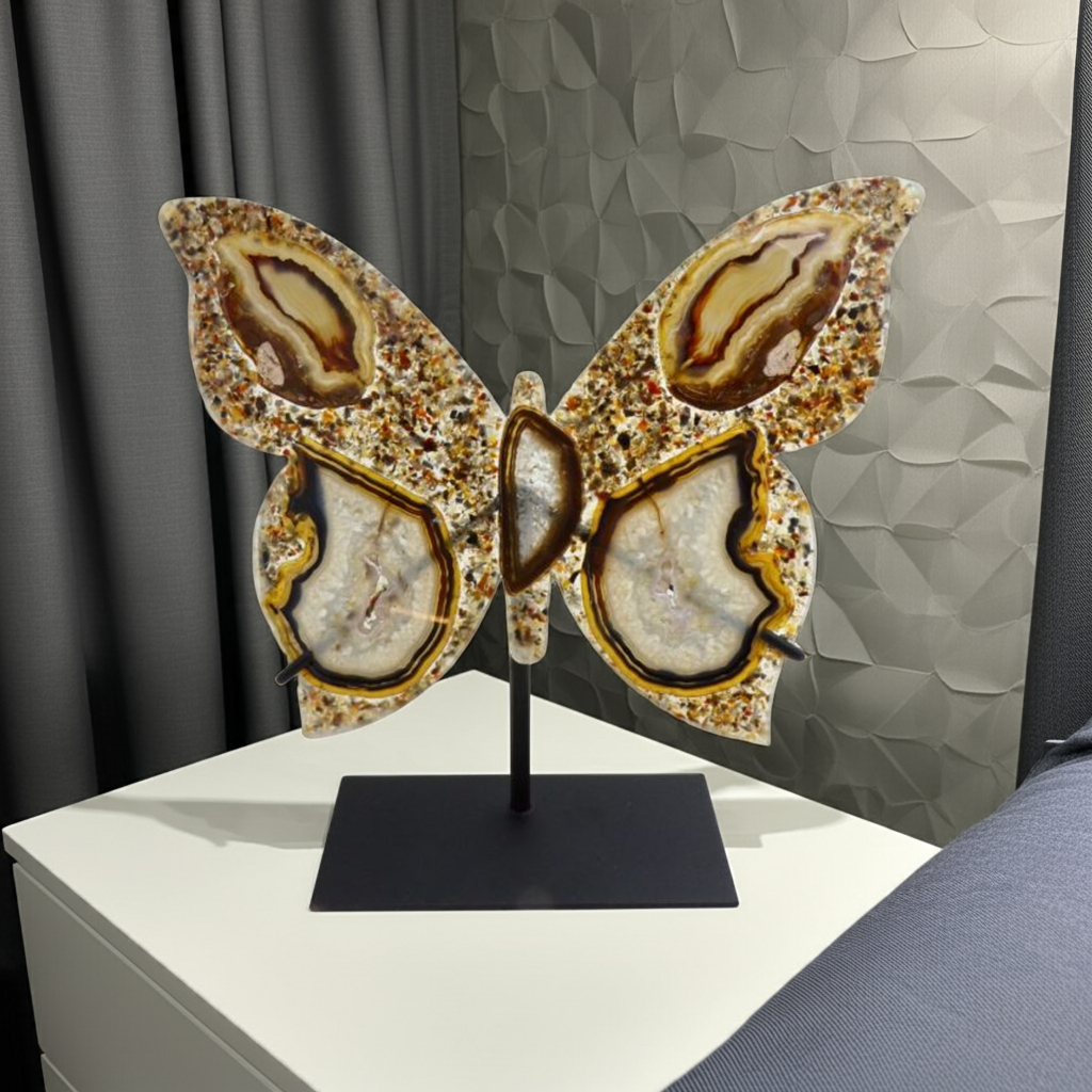 Elegant agate slice butterfly art piece from Brazil with intricate natural patterns, displayed on sleek metal stand