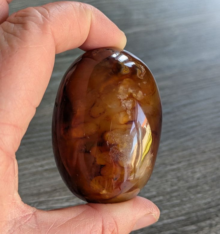Carnelian Palmstone with deep amber and yellow bandings