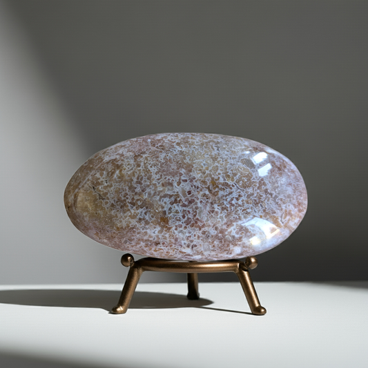 Close-up Ocean Jasper Palmstone displaying natural stone patterns for crystal healing therapy