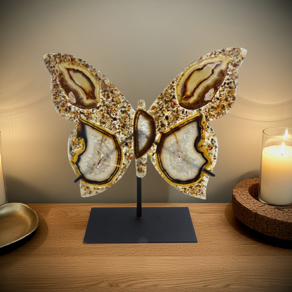 Museum-quality Brazilian agate butterfly sculpture featuring millions of years of natural formation, complete with display stand